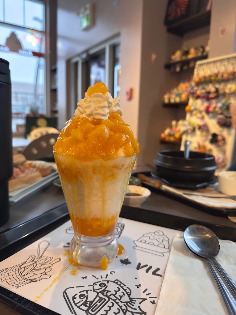 Mango bingsoo with real mango and snowflake shaved ice at Snowy Village Pacific Ave