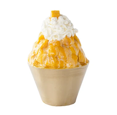 Mango bingsoo topped with fresh mango and whipped cream at Snowy Village in Saskatoon
