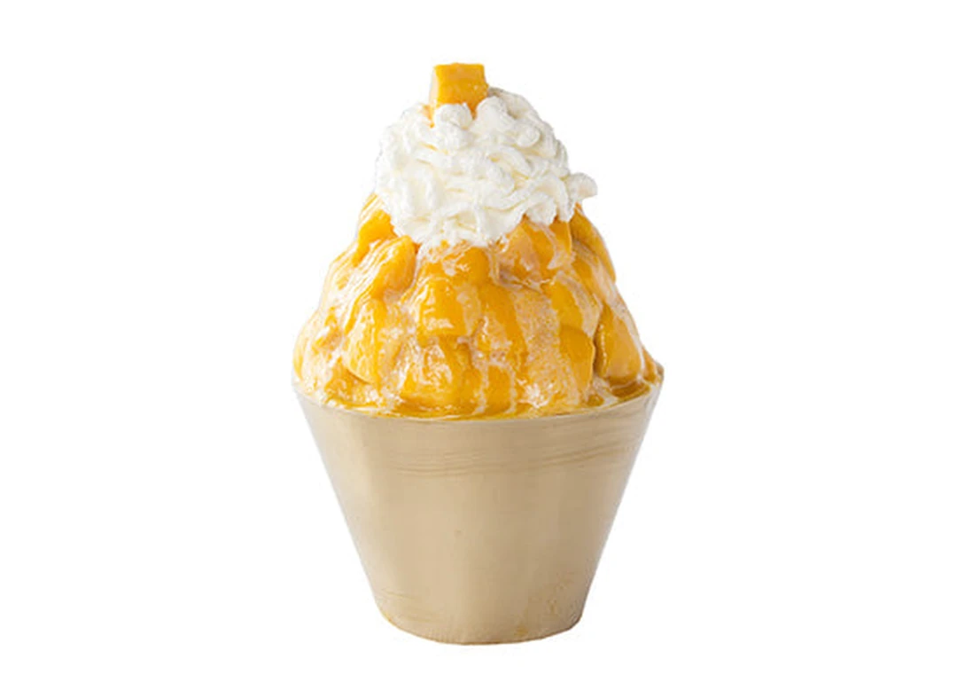 Mango bingsoo with real mango and snowflake shaved ice at Snowy Village Pacific Ave in Saskatoon